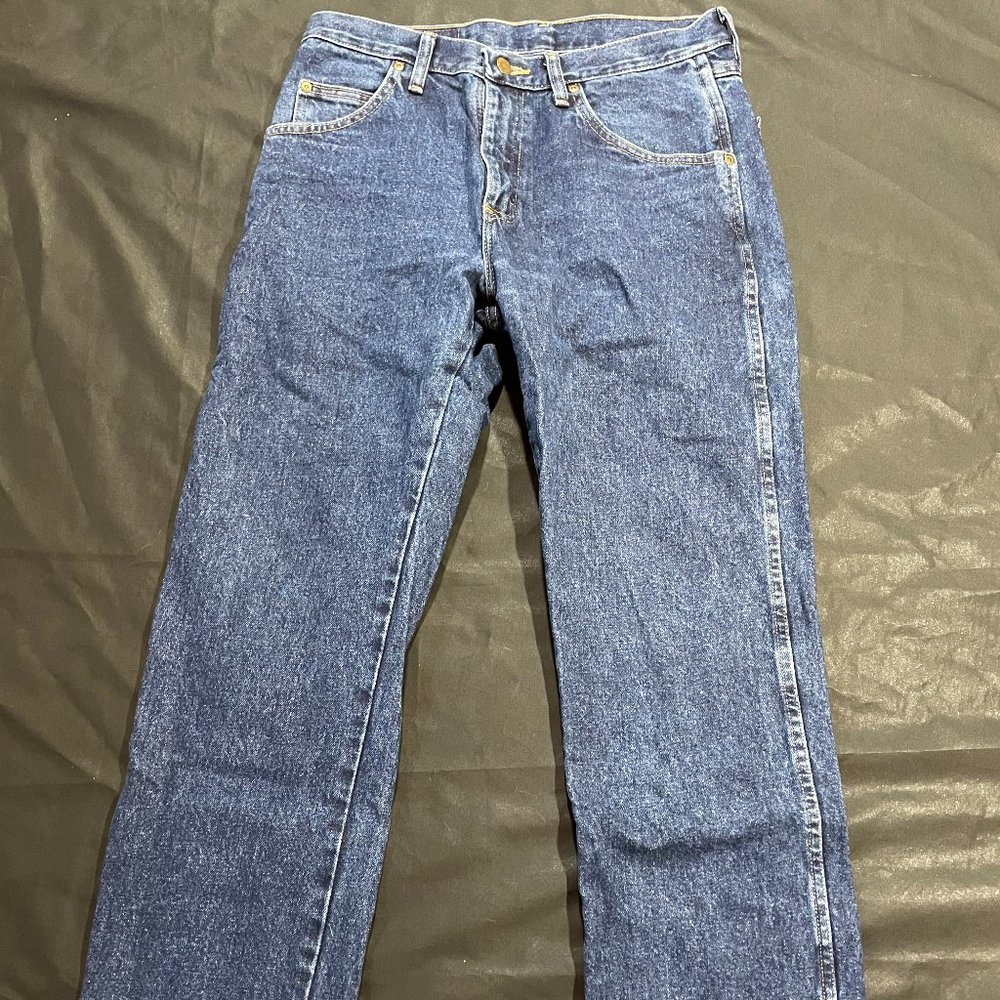 Very good condition used Wrangler Dark Blue 31x30